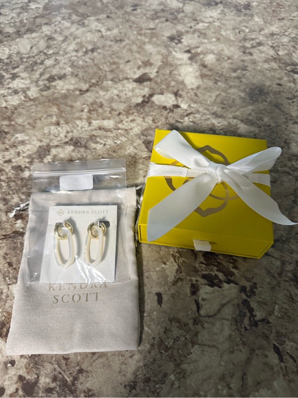 Kendra Scott Gold and White Elongated Hoop Earrings